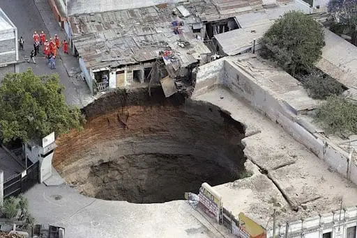 Sink-Hole In A Village